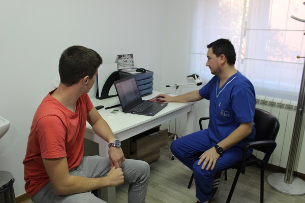 Razgovor kiropraktičara i pacijenta